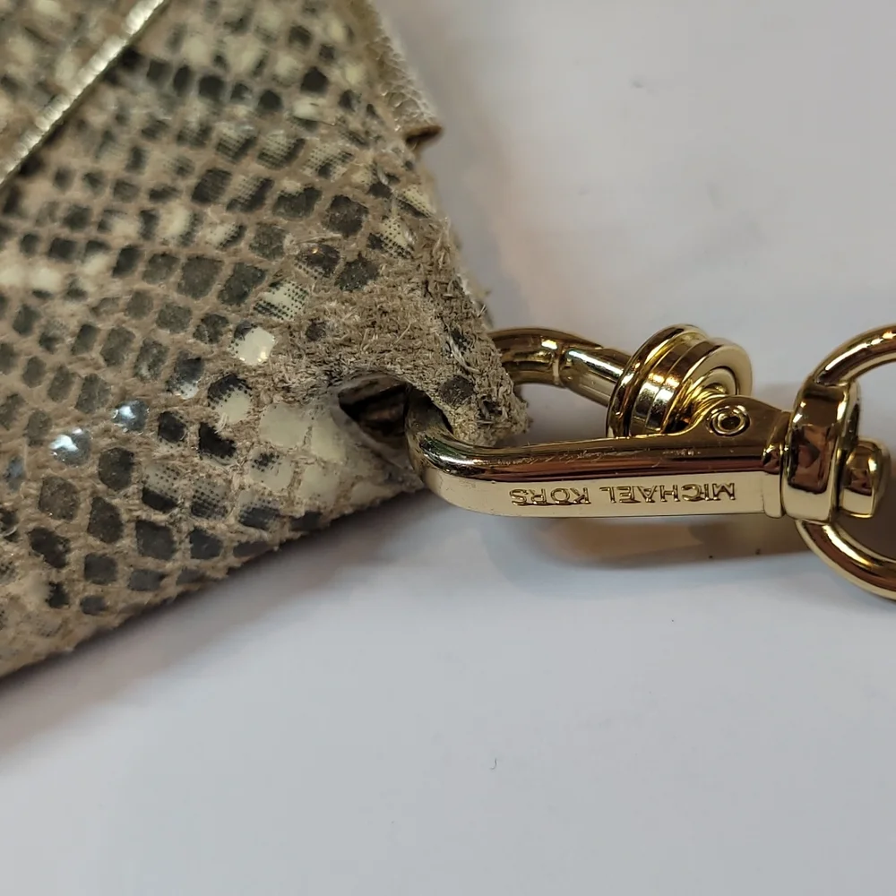 MICHAEL KORS SNAKE PRINT PHONE WRISTLET